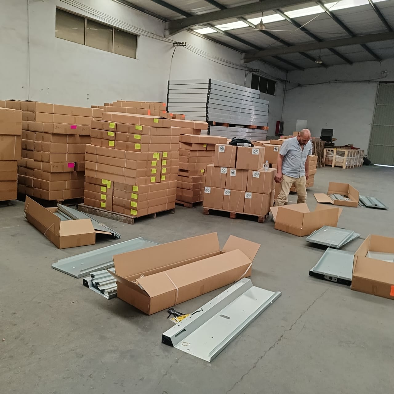 Warehouse review of components and prepared shipment parts